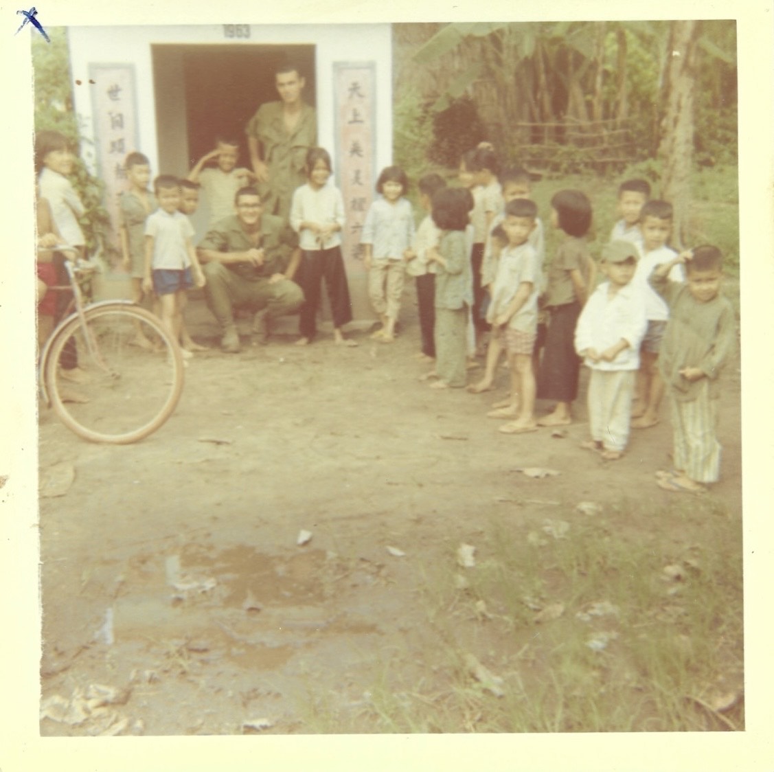 Rich with local children in Vietnam