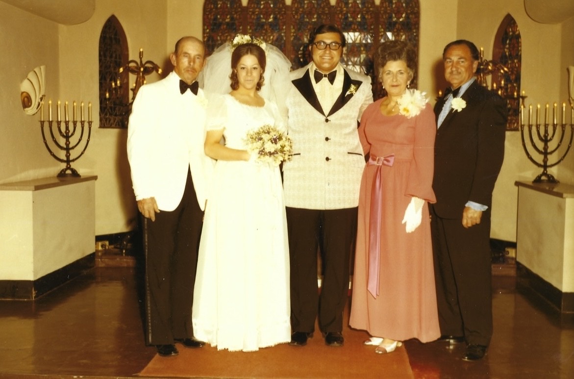 Rich and Diana with family on their wedding day